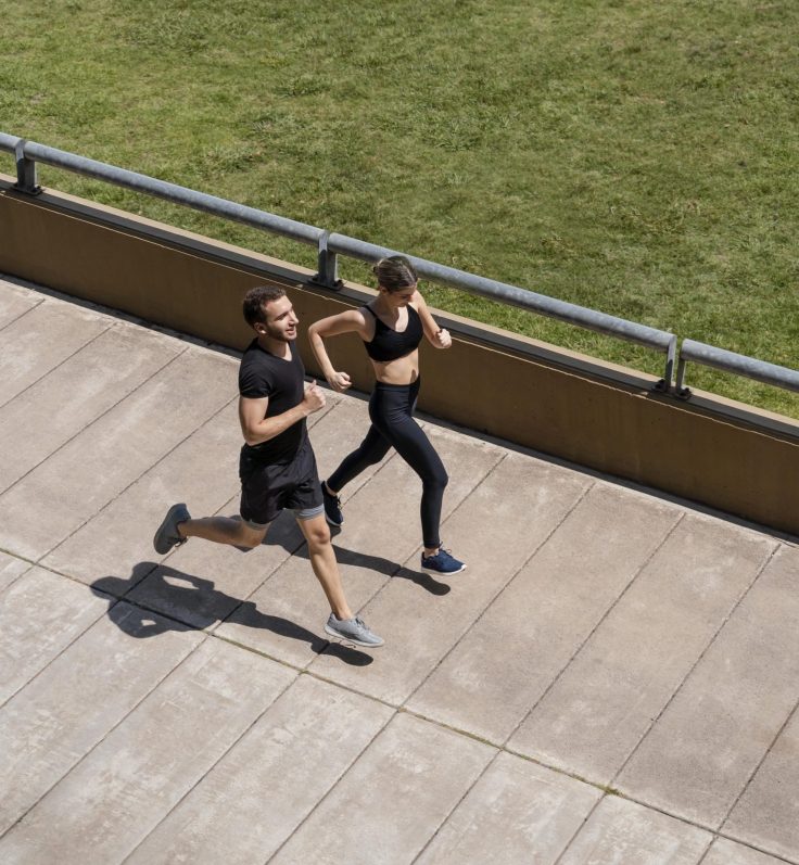 man-woman-jogging-together-outdoors